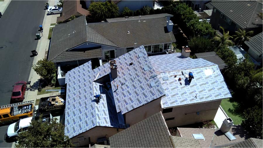 Concrete tile roof relay using fire-resistant Titanium FR underlayment in Irvine, California